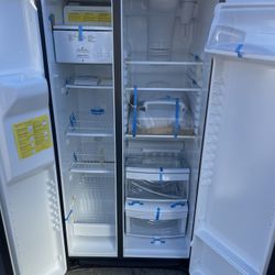 Ge side-by-side refrigerator we finance 3202 Waterloo Rd. in Stockton