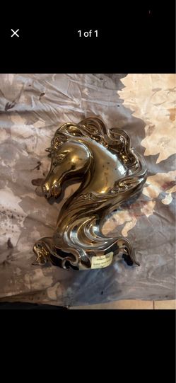 Polished brass horse head figurine
