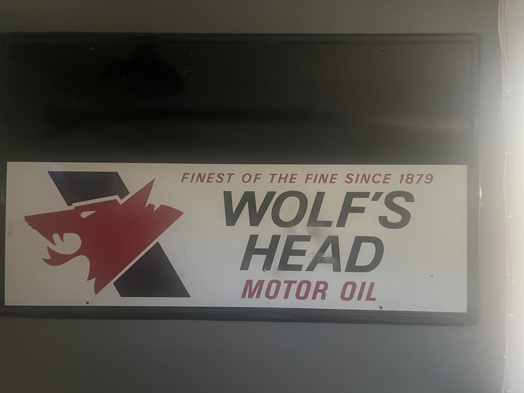 Embossed NOS Original Wolf’s Head Motor Oil Advertising Sign