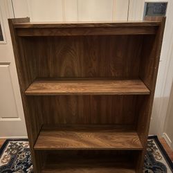  Bookshelf with three shelves. Two are adjustable. 
