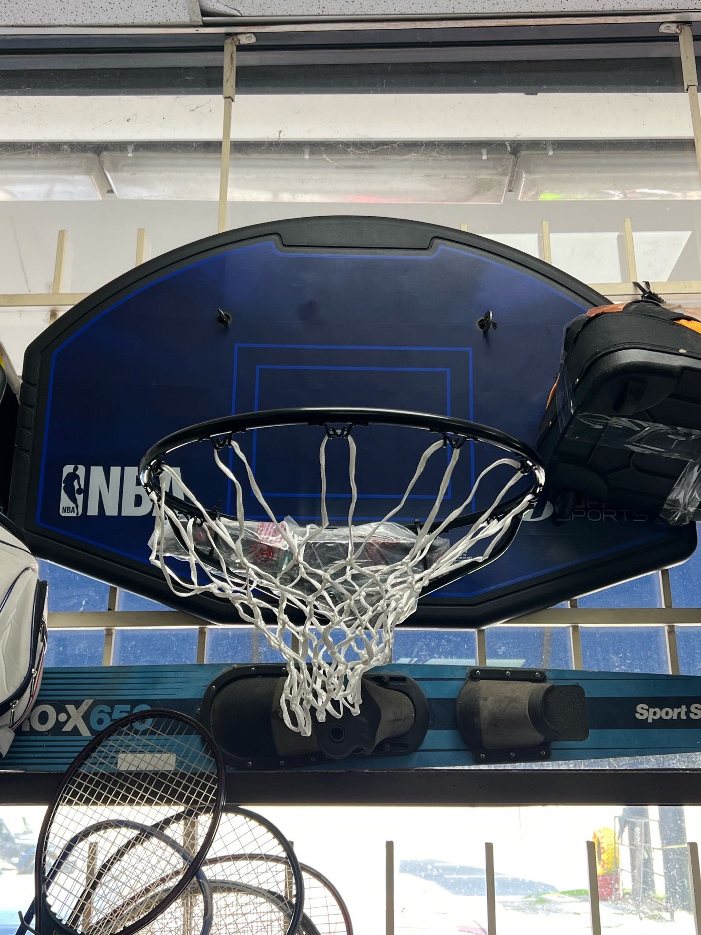Lifetime NBA branded basketball backboard and rim combo.