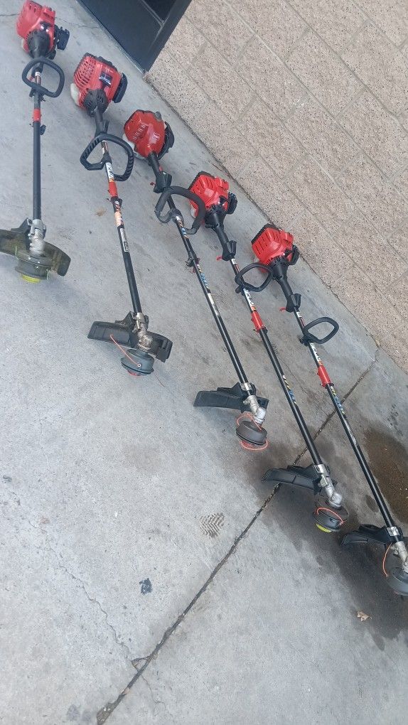 TROY BILT GAS 4 CICCLE STRING TRIMMER EACH USED (((EACH )