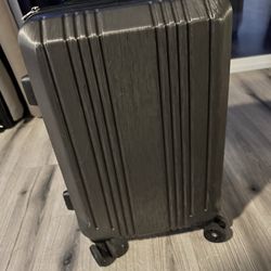Grey carry on luggage