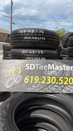 2 Michelin tires (185-65-15) with 95% tread life remaining.
