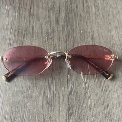 Mui Mui Sunglasses