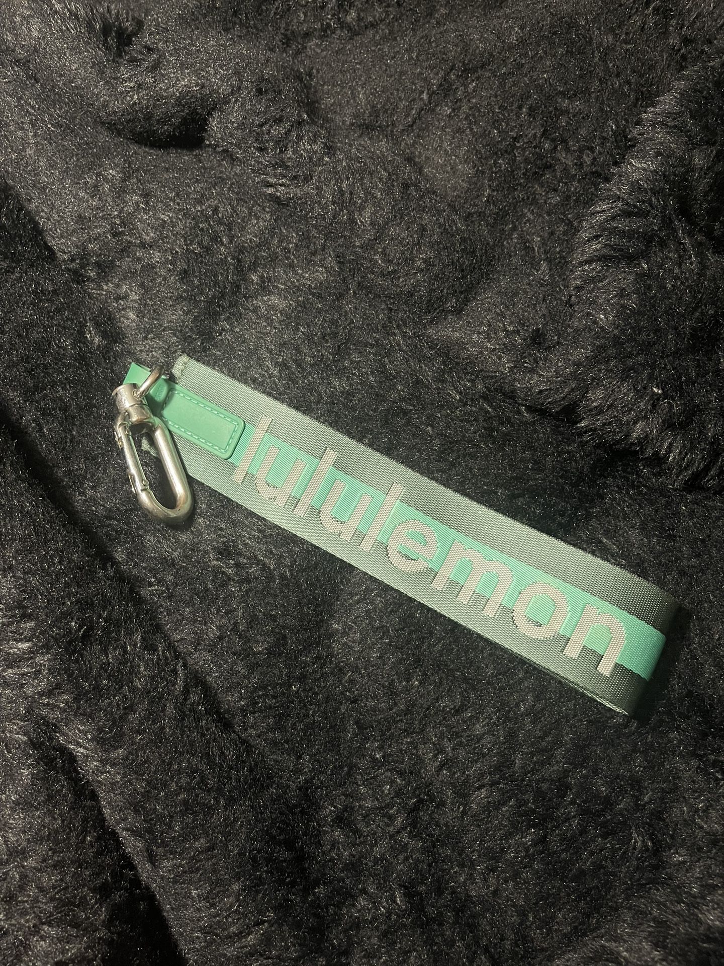 green lululemon keychain