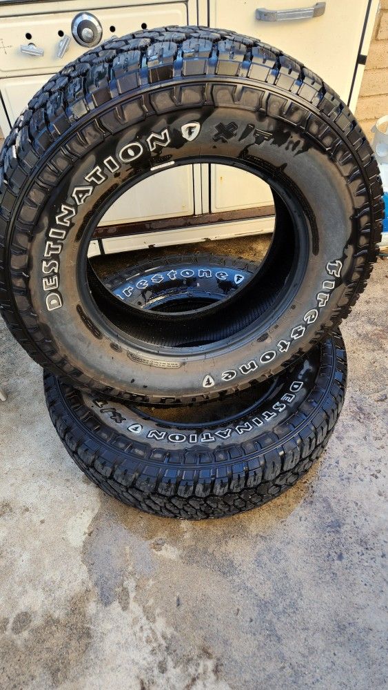 2 Firestone Destination Tires 275/70R18.
