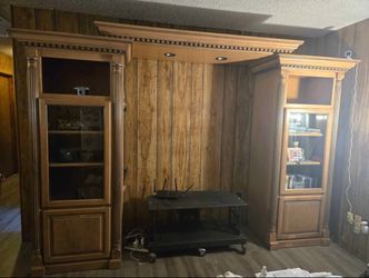 Entertainment Center 6.5' ft tall You can adjust the with depending on the size of the TV. We had a 65" Television but you can use a bigger size.  Ite