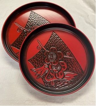 New but. Vintage, Firm, LACQUER WARE Nesting Trays, Round Black Red with Triangular Design Encompassing two Flowers, 2pc MELAMINE