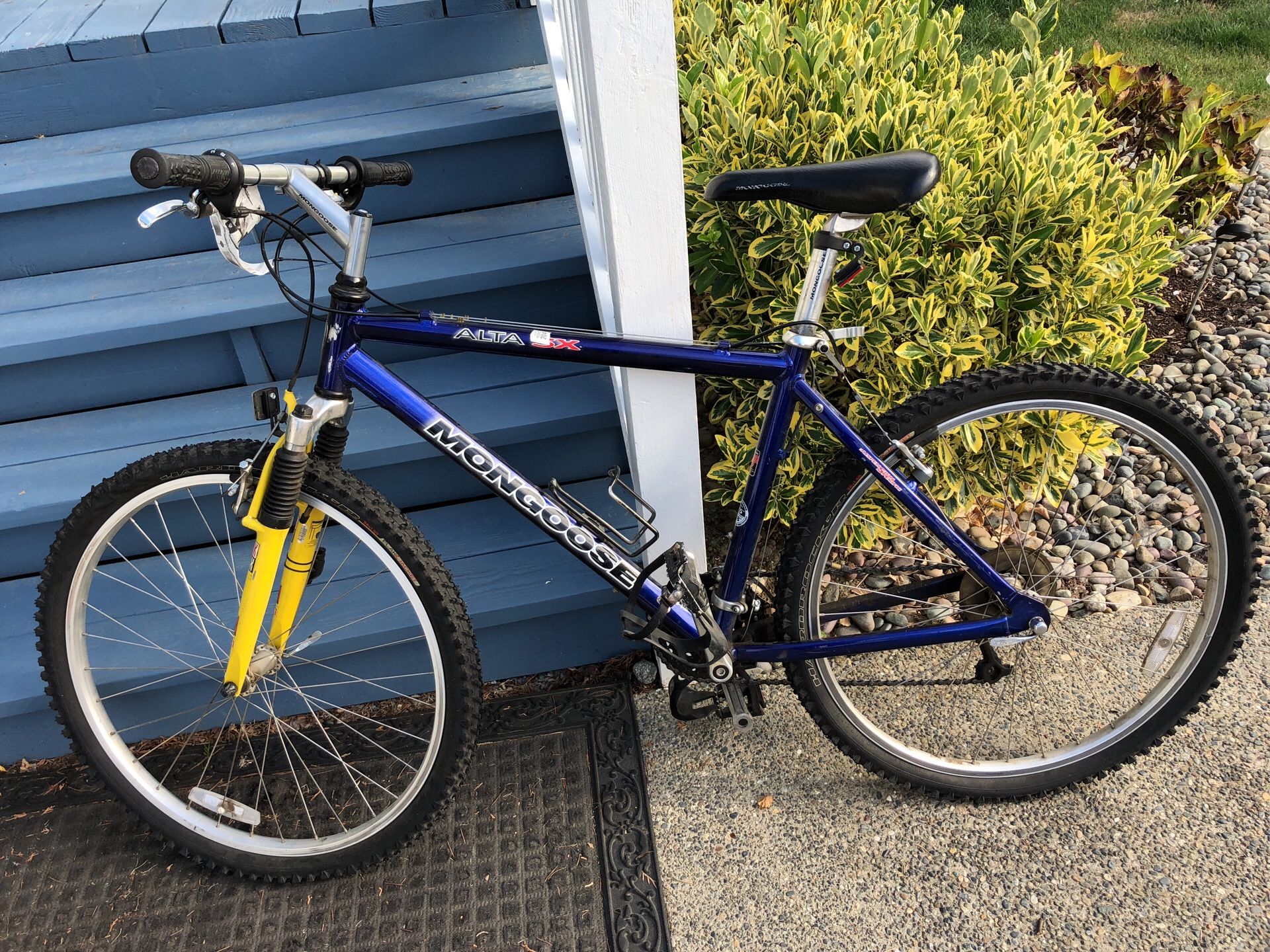 Mongoose Alta SX - Great Mountain Bike. I have ridden this both as a mountain bike and a road bike. I would just take tires off and throw a pair of
