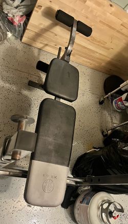 Leg extension and bench press workout equipment