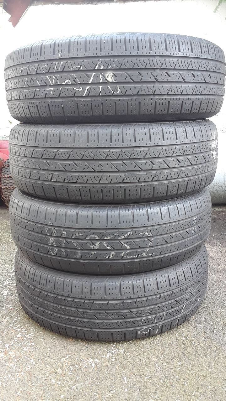 235/65/18 Continental cross contact set of 4 tires 70% tread great condition 250$ for 4 tires .