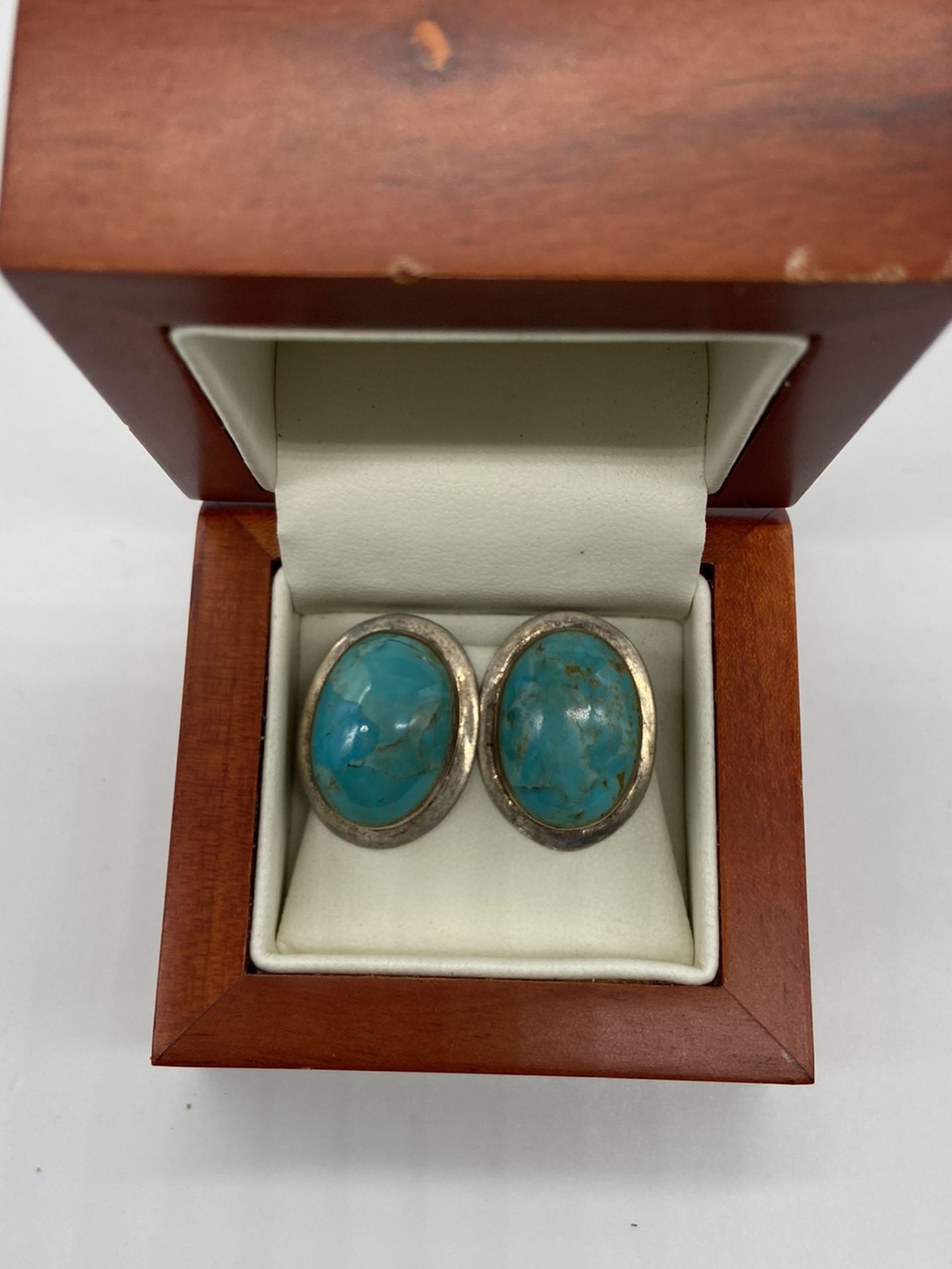 Real Turquoise Earrings Set In Sterling Silver