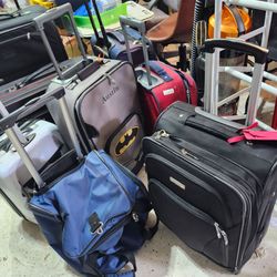 $20 each small children's carry-on or adult carry-on or large check in Luggage baggage suitcase