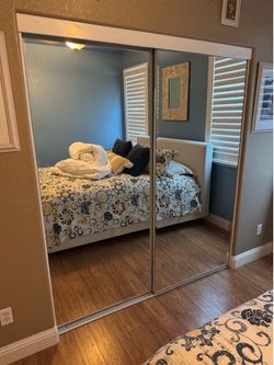 Bedroom closet glass doors - with track