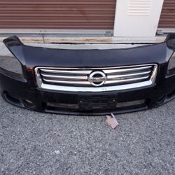 2009-2014 Nissan Maxima Complete Front Bumper With All The Accessories Oem.