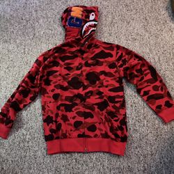 Red and black BAPE hoodie 