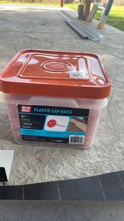 Plastic cap nails and 15 lb felt