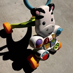 Baby toy helps to walk and it sings