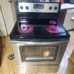 Excellent Working Whirlpool Black And Stainless Glass Top Stove With Self Cleaning Oven In Good Condition 