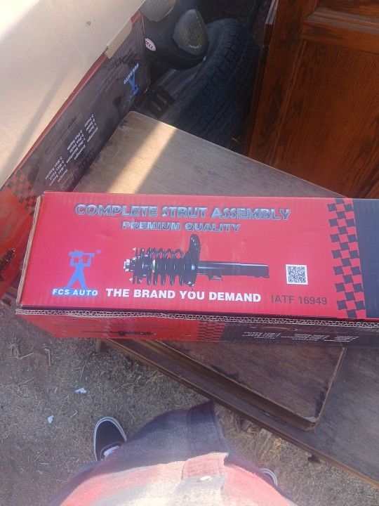 New Complete Strut Assembly With New CV Axle Shaft. Fits 2015 To 2021 Subaru WRX