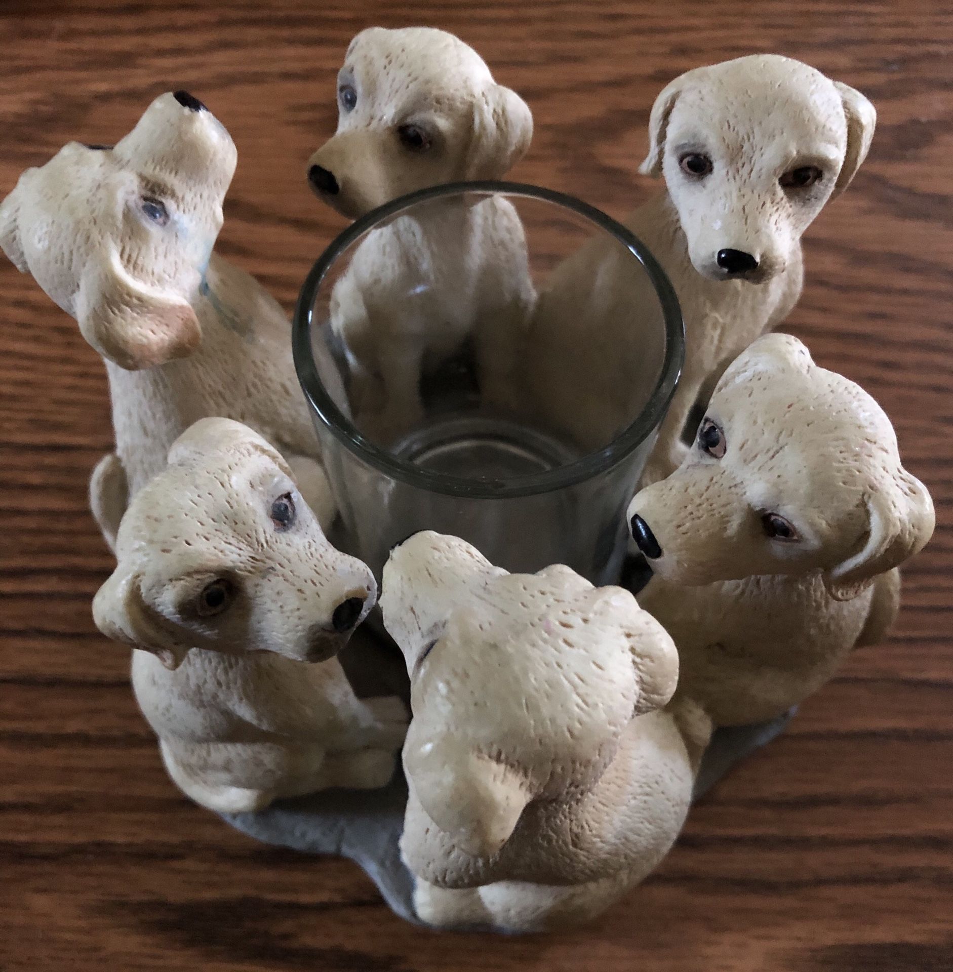 Votive candle holder surrounded by 6 yellow labs, made of resin