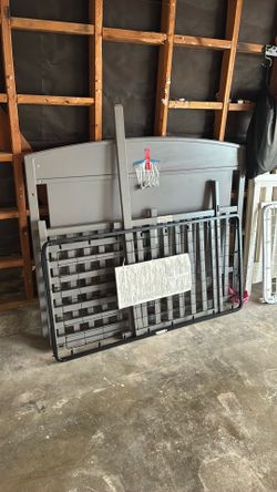 Grey baby crib