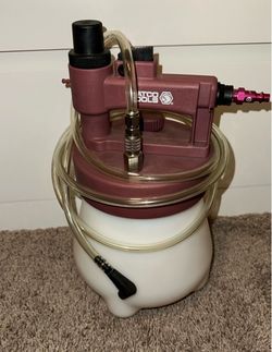 Vacuum brake bleeder
