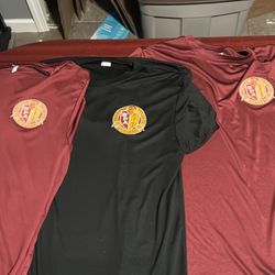 3 large brevard private academy shirts 2 maroon and 1 black 