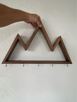 Shelf with hooks