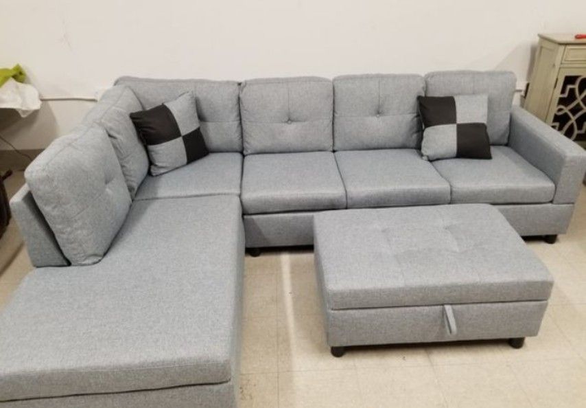 Brand New Light Grey Linen Sectional Set With Decorative Pillows & Storage Ottoman