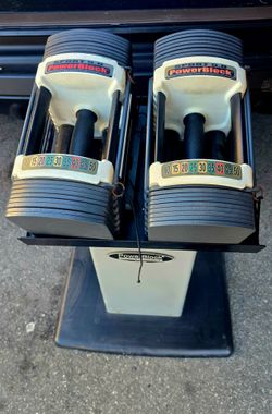 Adjustable dumbells
