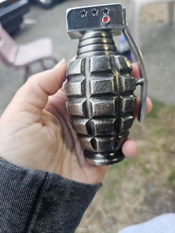 Collectable vintage "Combat PGL" hand grenade-shaped lighter