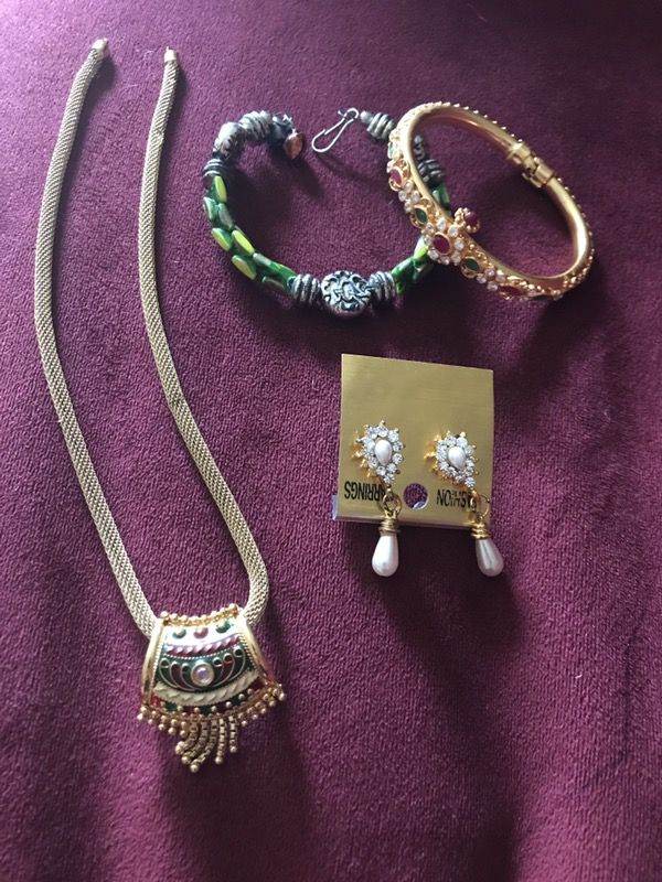 Beautiful Jewelry- one necklace,2 bracelets and 1 earrings.