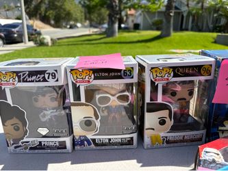 Elton John, Prince, and Freddy Mercury Funko Pops