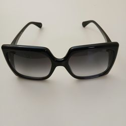 Gucci GG0876S 001 oversized (women's)  black sunglasses.