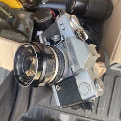 Assorted Vintage Cameras And Lenses 