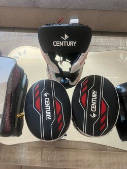 I have my daughters boxing head gear and practice mitts and gloves size l-xl and 8oz training gloves