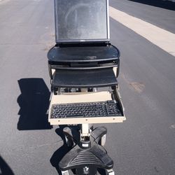 mobile computer workstation cart. Medical rolling PC stand or EMR cart. 