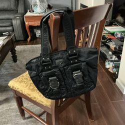 Lauren Ralfe Lauren elegant black purse with two outside magnets pockets and zipper inside pocket Like New