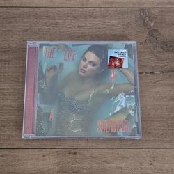 For Sale:
Brand New Still in Original Packaging Taylor Swift the Life of a Showgirl CD with Signed Photo 1