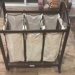 Laundry hamper with wheels 