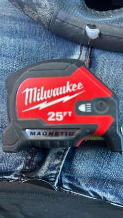 Brand new never used Milwaukee magnetic tape measure with flashlight built in.