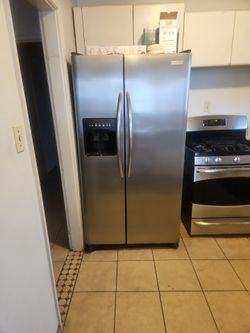 Stainless Steel Side-by-Side Refrigerator with Ice Dispenser