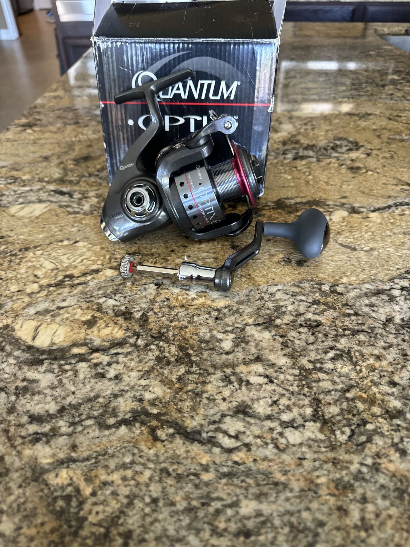 Quantum Optix 60 OP60F Spinning Reel 4 Ball Bearing 250 Yds. 17 lb Test 4.9:1 