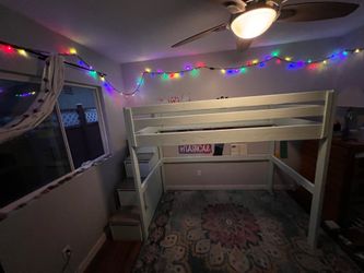 Custom built loft bed with storage steps