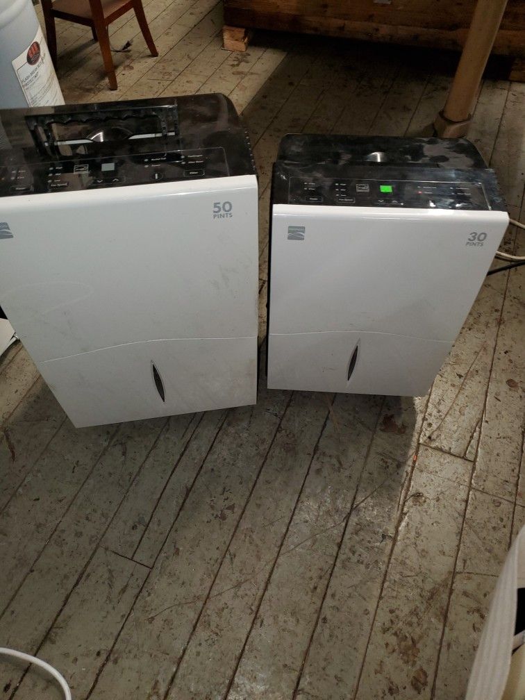 Two Identical Dehumidifiers 50-Pint And 30-pint 