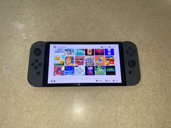 NINTENDO SWITCH OLED MOD Loaded with 125 SWITCH GAMES + 7500 CLASSIC GAMES