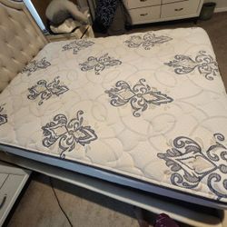 Sturdy queen-size bed (Frame and Mattress)