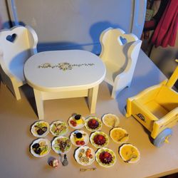 Two chairs, table, wheelbarrow and plates of food for 18 in dolls
